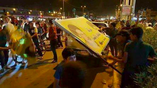 به زیر کشیده شدن عکس‌های خمینی و خامنه‌ای در شهرهای جنوبی و شیعه نشین عراق